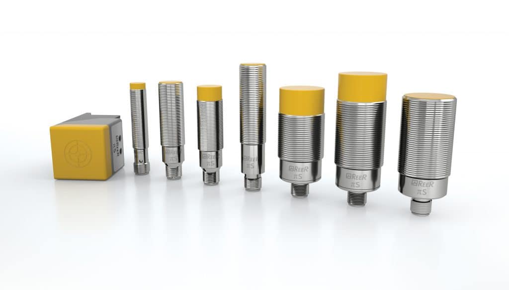 Row of Pi-Safe stainless steel inductive proximity sensors with yellow tips